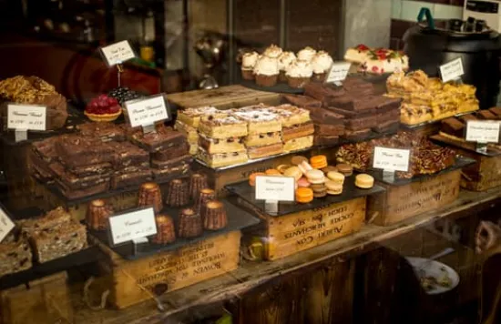 Assorted pastries in bakery display case
