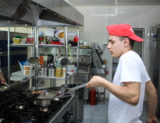chef sauting in kitchen