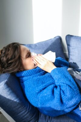 woman blows nose